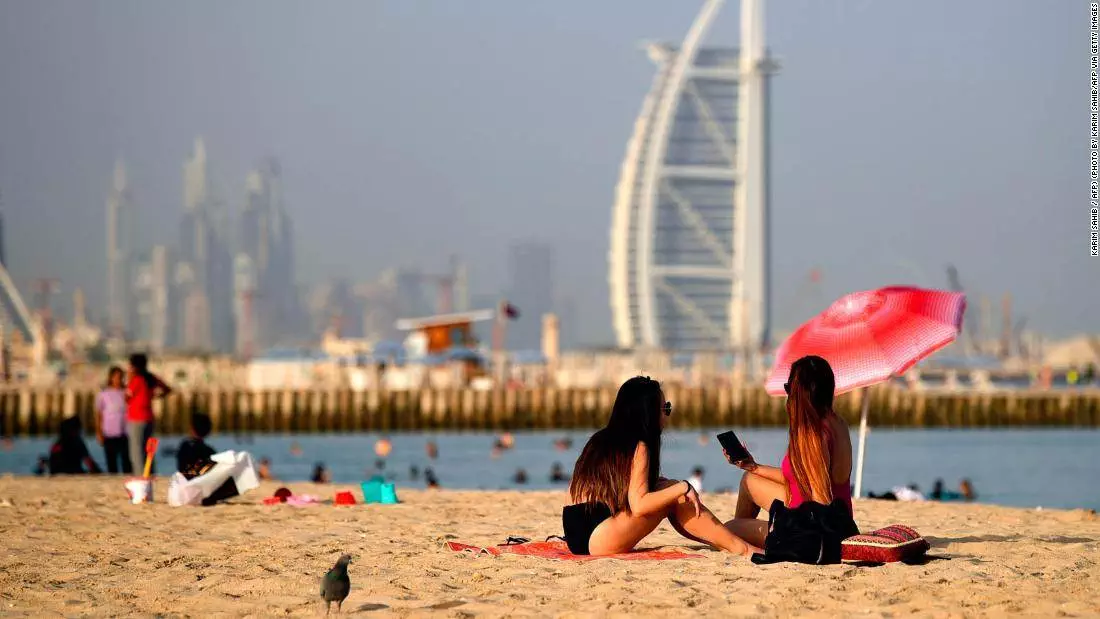 Dubai cracks down on tourism as Covid-19 cases surge